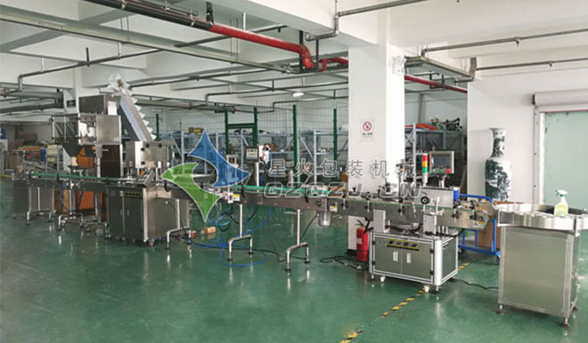 全自動顆粒罐裝包裝生產(chǎn)線星火廠房拍攝